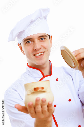 Photo: Young cook preparing food Young cook preparing food