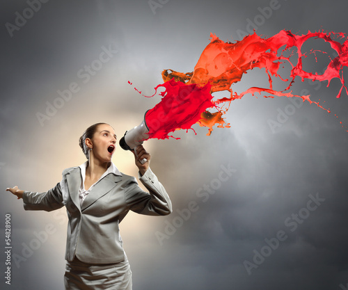 Photo: businesswoman with megaphone businesswoman with megaphone