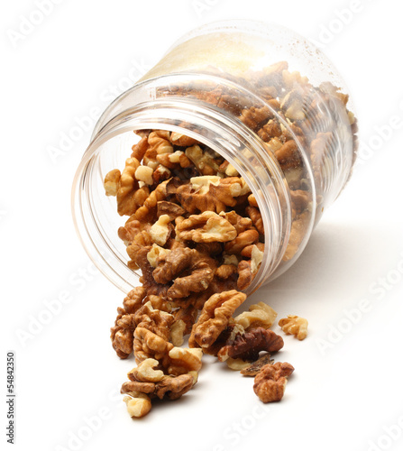 Photo: Heap of walnuts in container Heap of walnuts in container