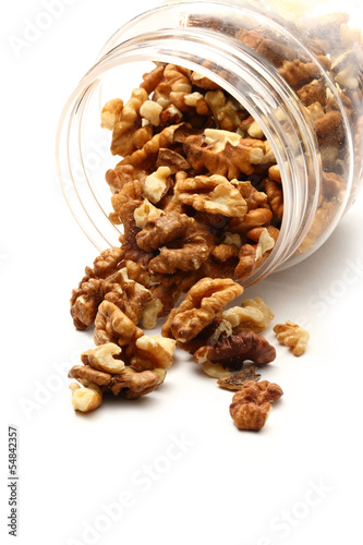 Photo: Heap of walnuts in container Heap of walnuts in container