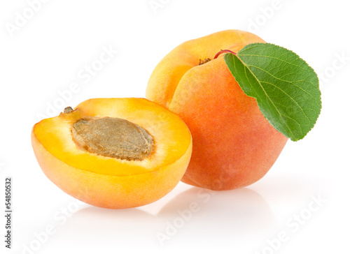 Photo: Ripe Apricots with Leaf Isolated on White Background Ripe Apricots with Leaf Isolated on White Background