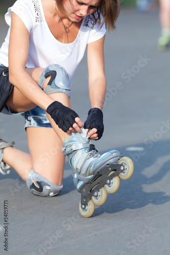 Photo: Roller skate girl skating. Roller skate girl skating.