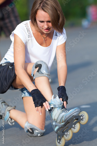 Photo: Roller skate girl skating. Roller skate girl skating.