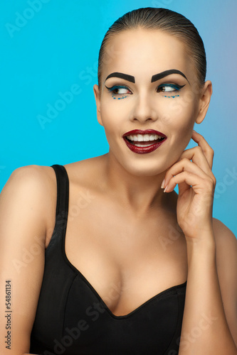 Photo: portrait of a girl with makeup portrait of a girl with makeup