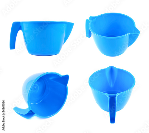 Photo: Plastic measuring cup isolated Plastic measuring cup isolated