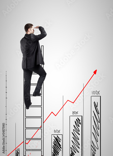 Photo: businessman climbing businessman climbing