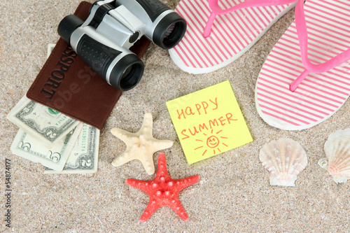 Photo: Composition with flip flops, binoculars, notepad and money, Composition with flip flops, binoculars, notepad and money,