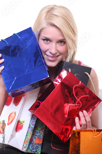 Photo: junge frau mit geschenken junge frau mit geschenken