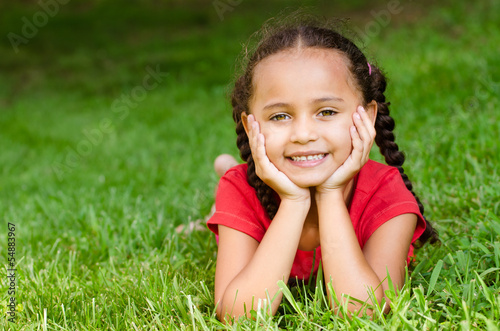 Photo: Summer portrait of pretty mixed race girl outdoors Summer portrait of pretty mixed race girl outdoors