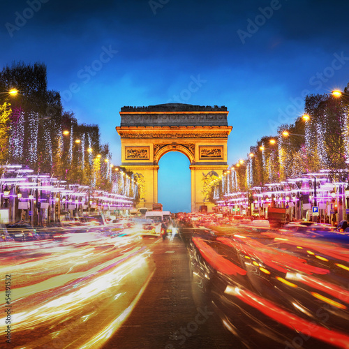 Photo: Arc de triomphe Paris city at sunset - Arch of Triumph and Champ Arc de triomphe Paris city at sunset - Arch of Triumph and Champ