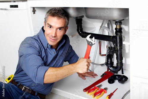 Photo: Plumber. Plumber.