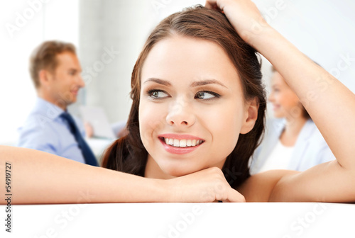 Photo: attractive young businesswoman in office attractive young businesswoman in office