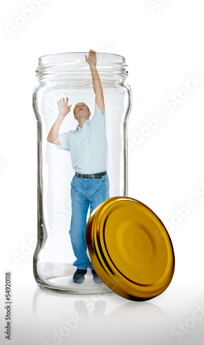 Photo: Man Escapes from a Glass Jar Man Escapes from a Glass Jar