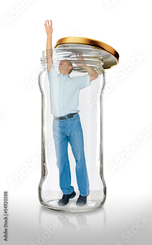 Photo: Man Escapes from a Glass Jar Man Escapes from a Glass Jar