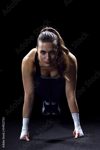 Photo: woman doing push ups woman doing push ups