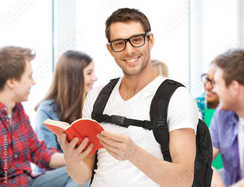 Photo: student reading book at school student reading book at school