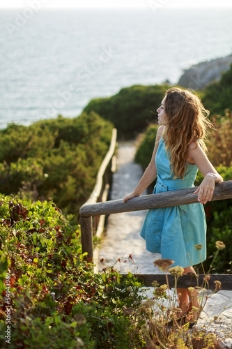 Photo: Young woman at the seaside Young woman at the seaside