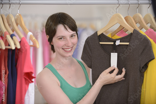 Photo: Woman shopping for clothes Woman shopping for clothes