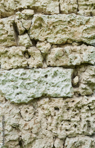 Photo: Old vintage stone wall as background Old vintage stone wall as background