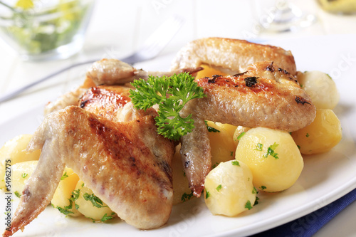 Photo: Roasted chicken wings and potatoes Roasted chicken wings and potatoes