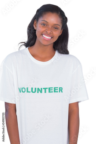 Photo: Smiling young woman wearing volunteer tshirt Smiling young woman wearing volunteer tshirt