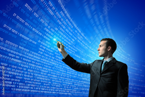 Photo: Businessman and media screen Businessman and media screen