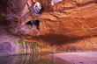 Photo: USA, Utah, Grand Staircase-Escalante National Monument, Neon Canyon, Tourist in Golden Cathedral USA, Utah, Grand Staircase-Escalante National Monument, Neon Canyon, Tourist in Golden Cathedral
