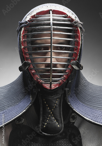 Photo: Kendo Kämpfer mit Gesichtsmaske Kendo Kämpfer mit Gesichtsmaske