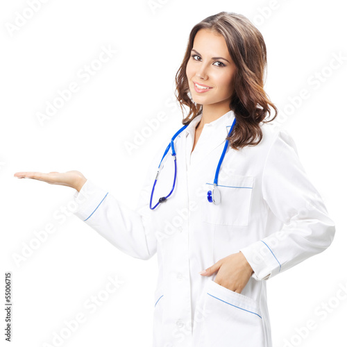 Photo: Doctor showing something, isolated Doctor showing something, isolated