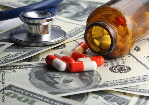 Photo: pills and money pills and money