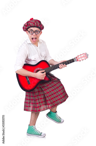 Photo: Funny scotsman with guitar on white Funny scotsman with guitar on white
