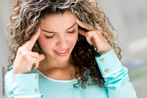 Photo: Business woman with a headache Business woman with a headache
