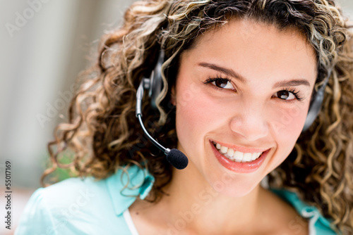 Photo: Woman at a call center Woman at a call center
