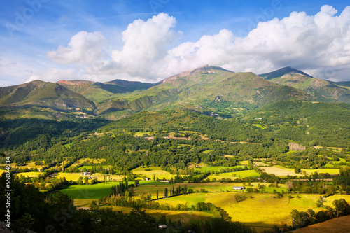 Photo: Valley at mountains in summer day. Huesca Valley at mountains in summer day. Huesca