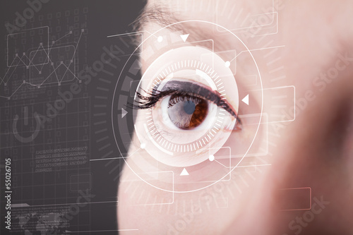 Photo: Cyber girl with technolgy eye looking Cyber girl with technolgy eye looking