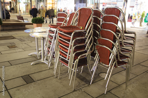 Photo: Café furniture after café closure by night Café furniture after café closure by night