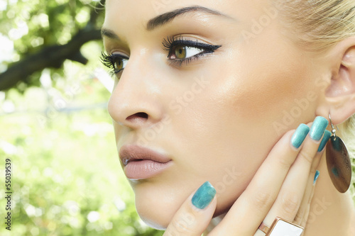 Photo: Beautiful girl with green eyes. beauty woman. nature Beautiful girl with green eyes. beauty woman. nature
