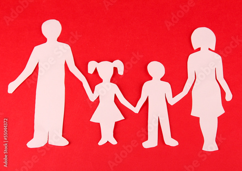 Photo: Family from paper on bright background Family from paper on bright background