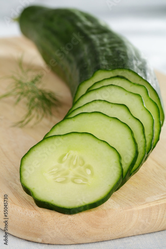 Photo: Salatgurke in Scheiben geschnitten Salatgurke in Scheiben geschnitten