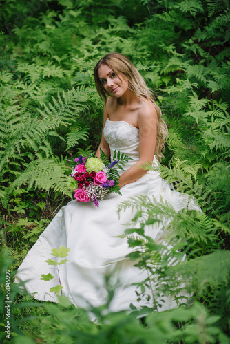 Photo: bride in a green forest bride in a green forest
