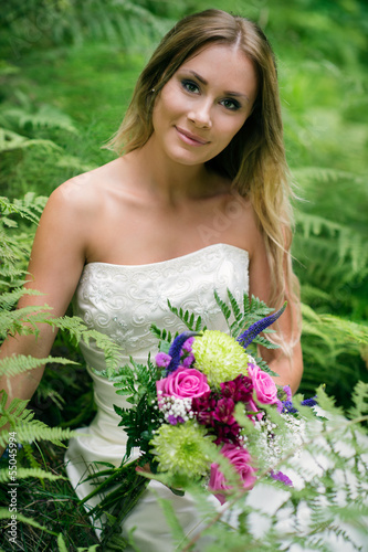 Photo: bride in a green forest bride in a green forest