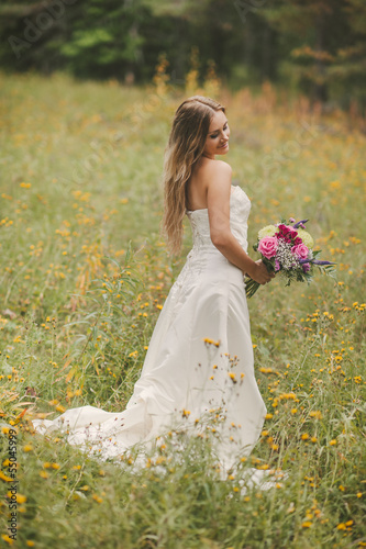 Photo: a beautiful bride in her wedding dress a beautiful bride in her wedding dress