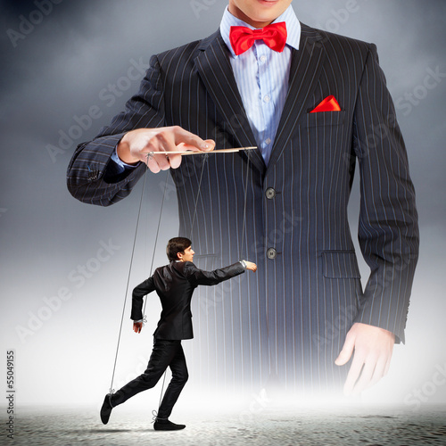 Photo: Businessman puppeteer Businessman puppeteer