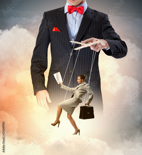 Photo: Businessman puppeteer Businessman puppeteer