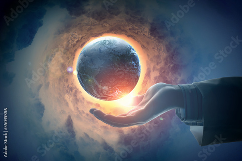 Illustration: Image of earth planet on hand Image of earth planet on hand