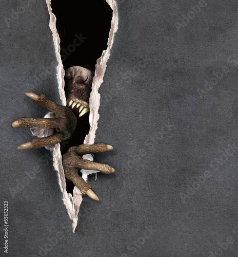 Illustration: Monster tearing a paper Monster tearing a paper