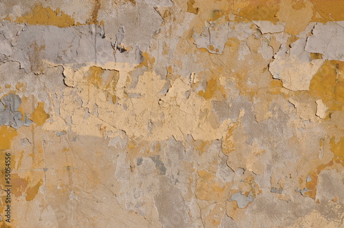 Photo: Old wall with peeling yellow paint Old wall with peeling yellow paint