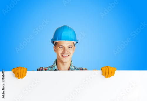 Photo: worker with blank board worker with blank board
