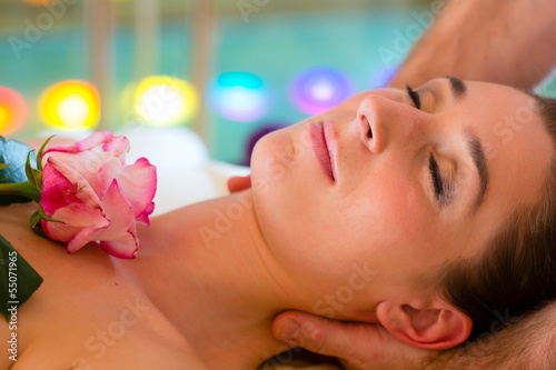 Photo: Woman enjoying head massage in a spa Woman enjoying head massage in a spa