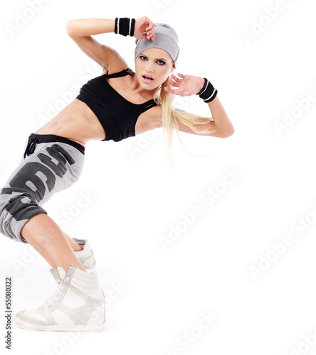 Photo: modern style dancer posing on studio background modern style dancer posing on studio background